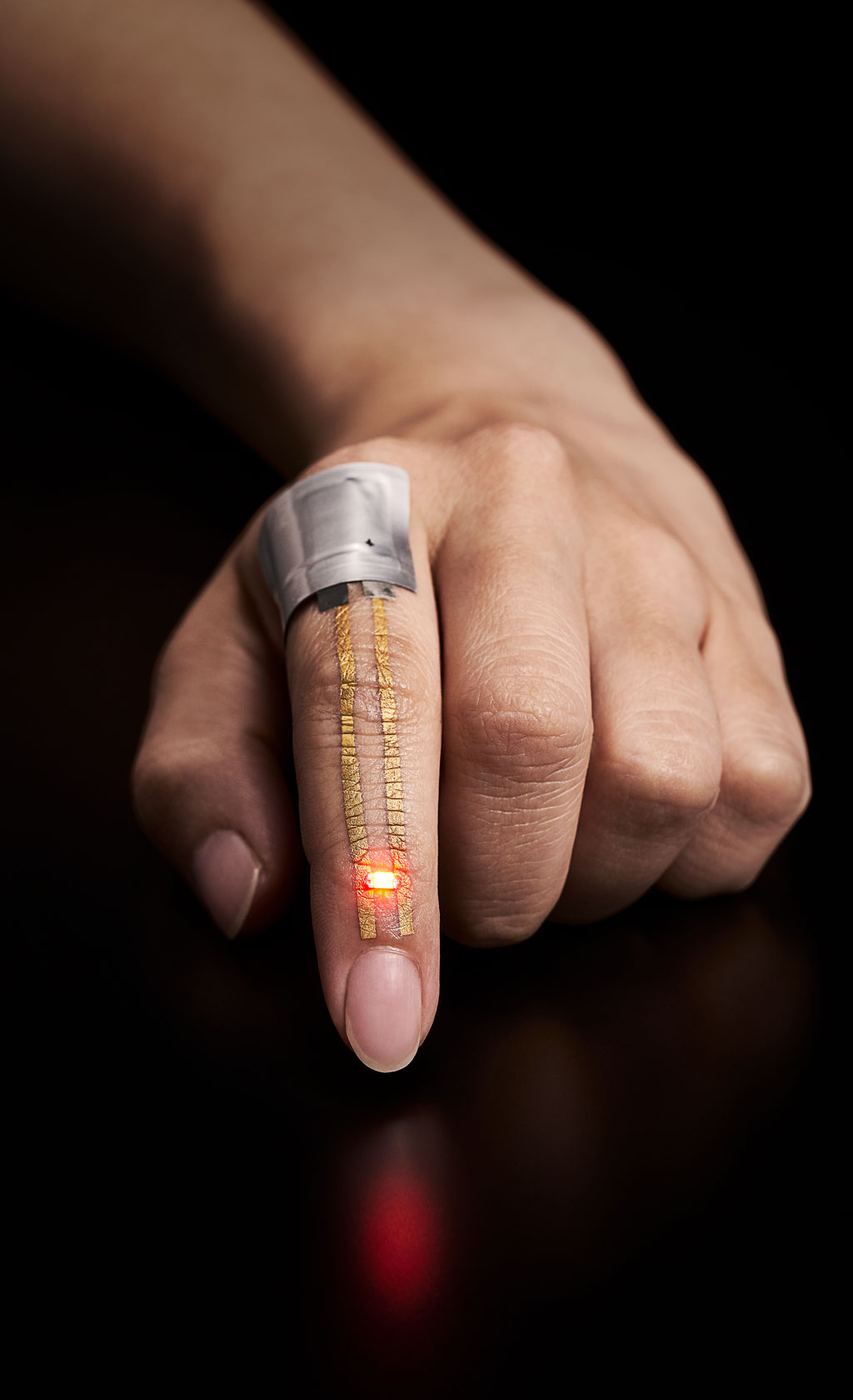 Flexible nanomesh worn on an index finger