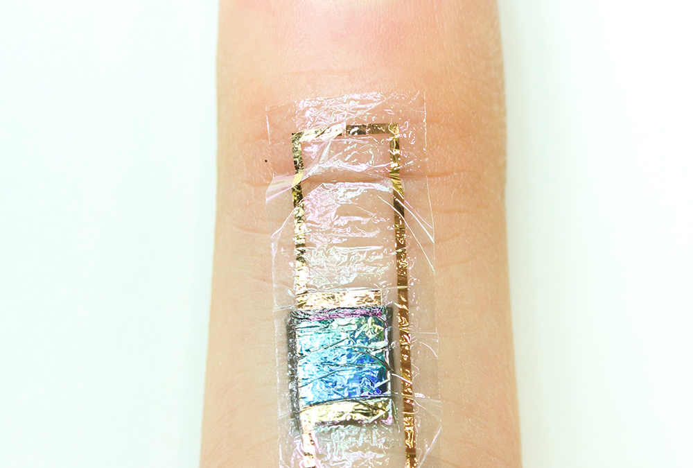 A self-powered heart monitor taped to the skin