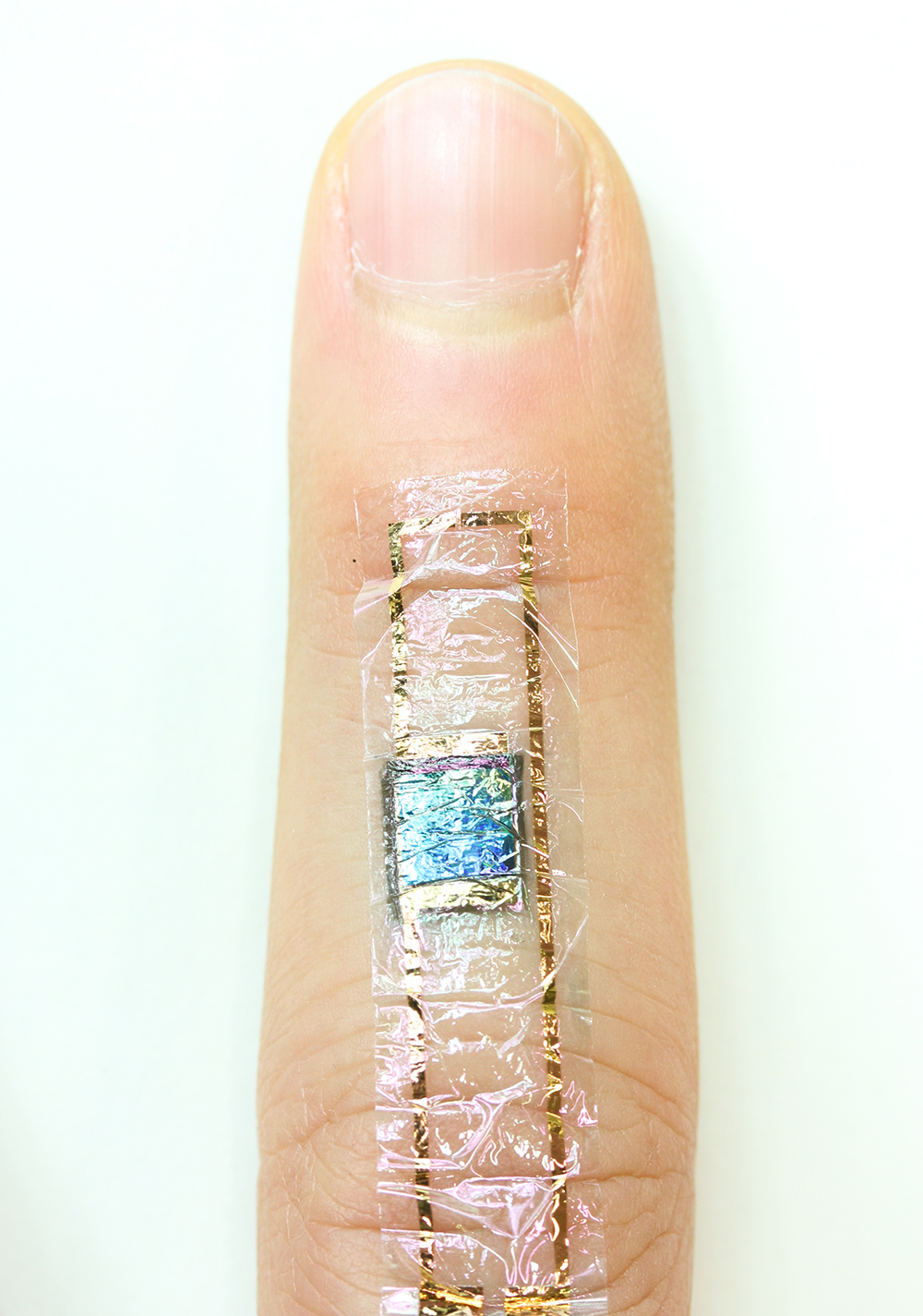 A self-powered heart monitor taped to the skin